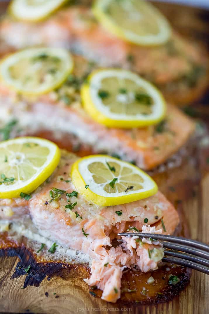 side view of honey garlic cedar plank salmon the grill