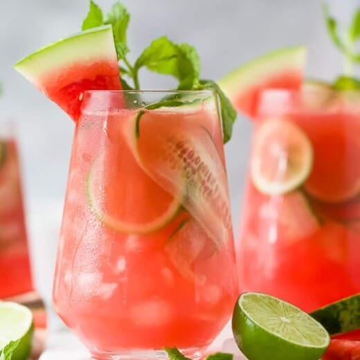 a glass filled with watermelon cucumber gin cocktail