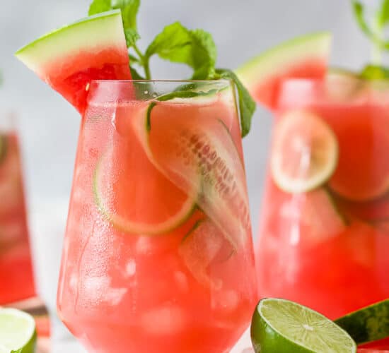 a glass filled with watermelon cucumber gin cocktail