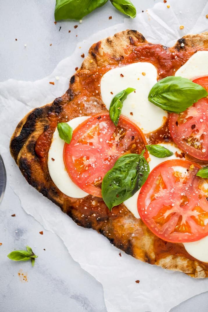 overhead photo of the best grilled pizza recipe with margherita toppings