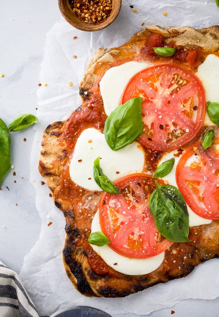 overhead photo of the best grilled pizza recipe ever