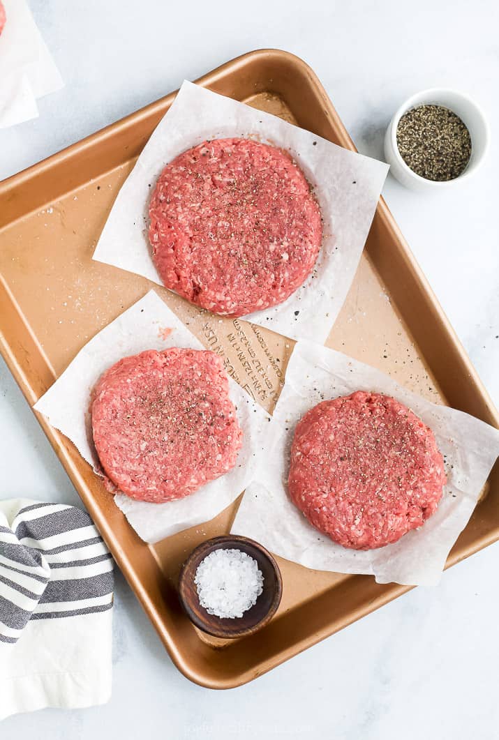 formed burger patties on a baking sheet