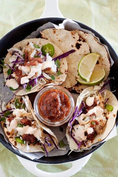 grilled fish tacos with cabbage slaw and sriracha sour cream