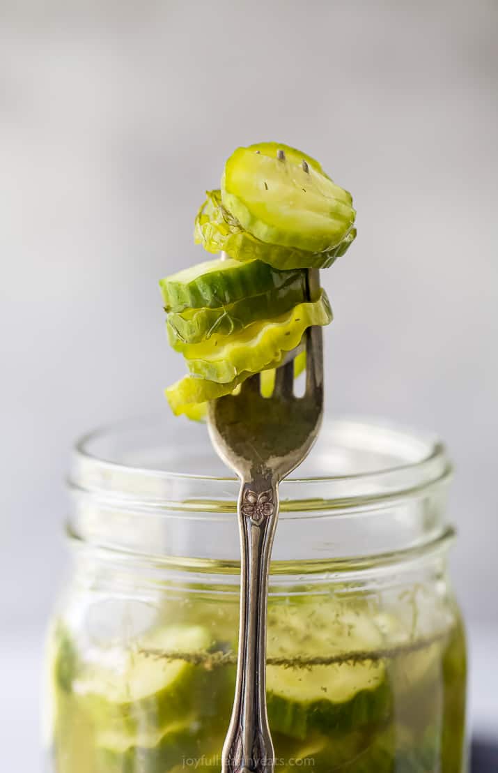 dill pickles on a fork