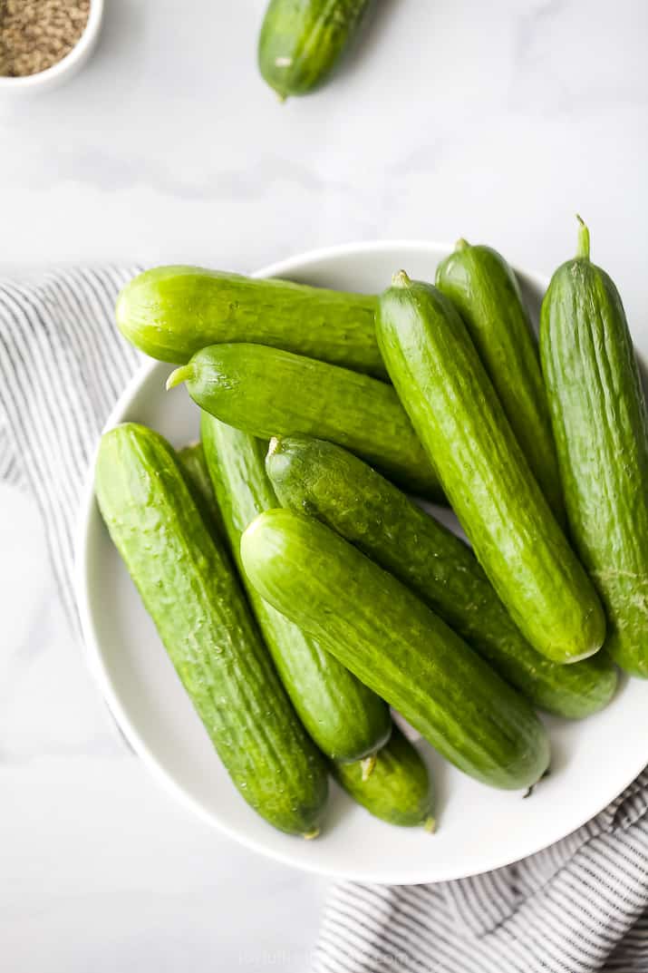 raw pickling cucumbers in a bowl