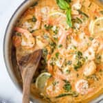 garlic shrimp with tomatoes in a skillet