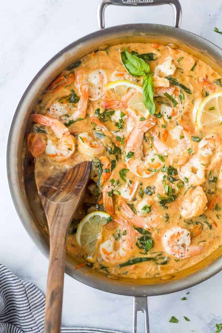 garlic shrimp with tomatoes in a skillet