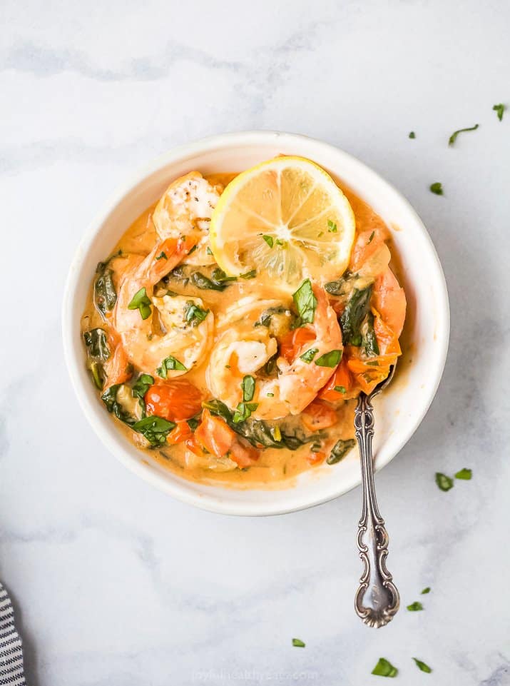 a bowl filled with tuscan garlic shrimp