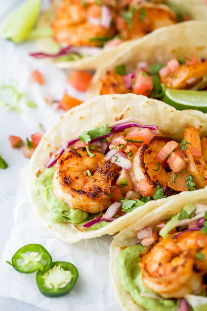 tacos filled with shrimp and cabbage slaw