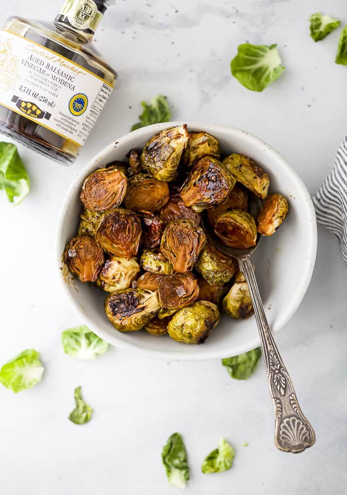 a bowl filled with balsamic brussel sprouts