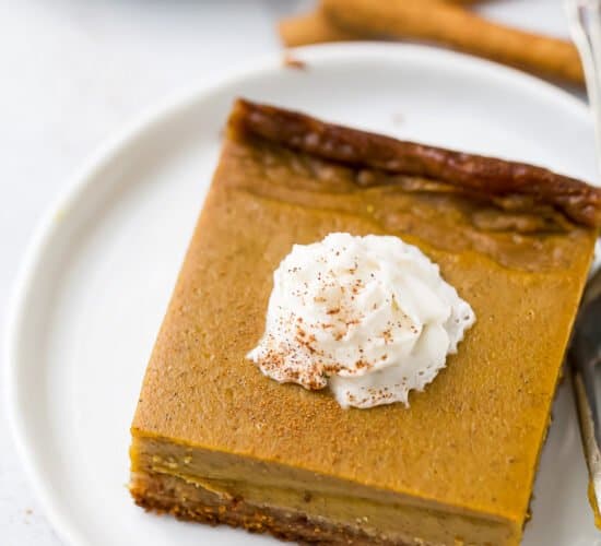 close up of pumpkin pie bars on a plate