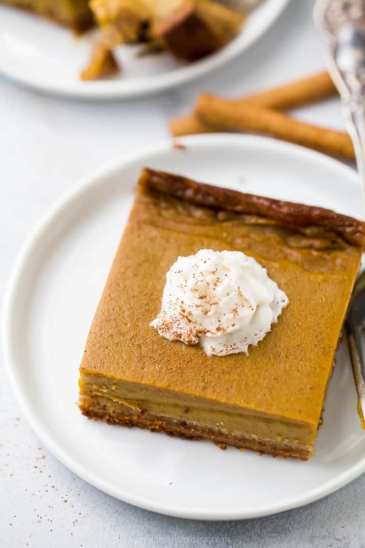 close up of pumpkin pie bars on a plate