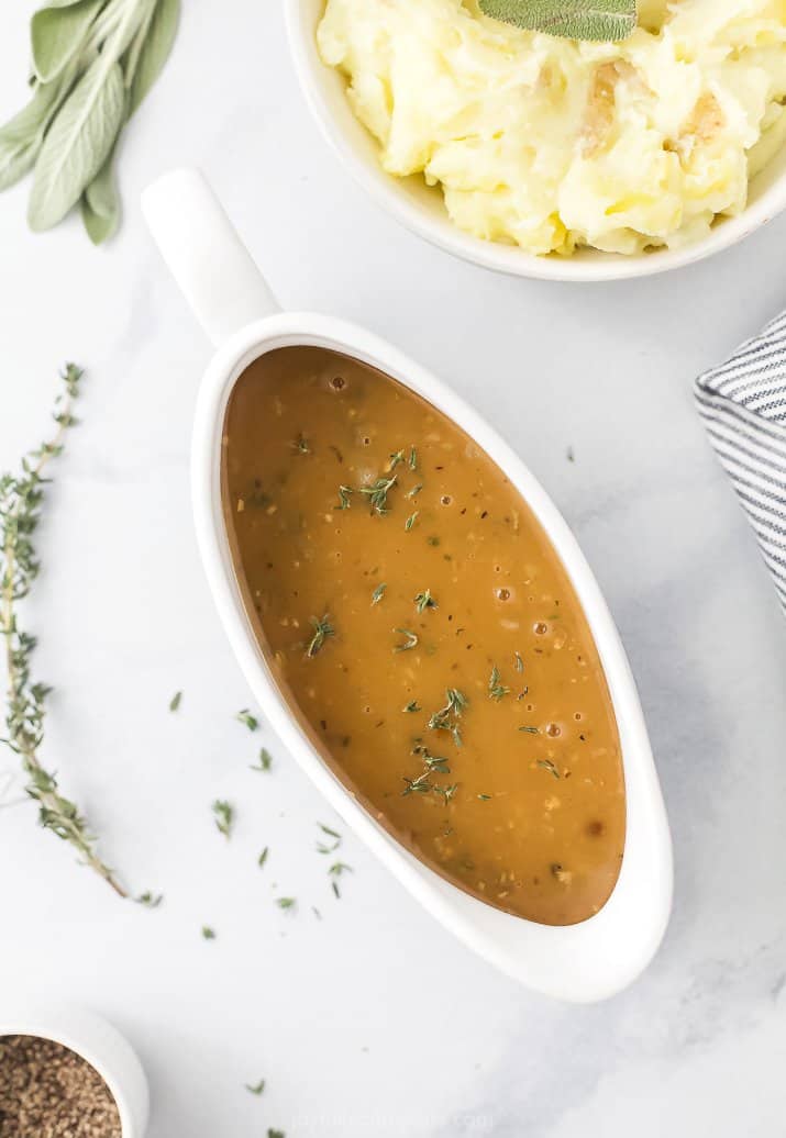 gravy boat filled with brown gravy