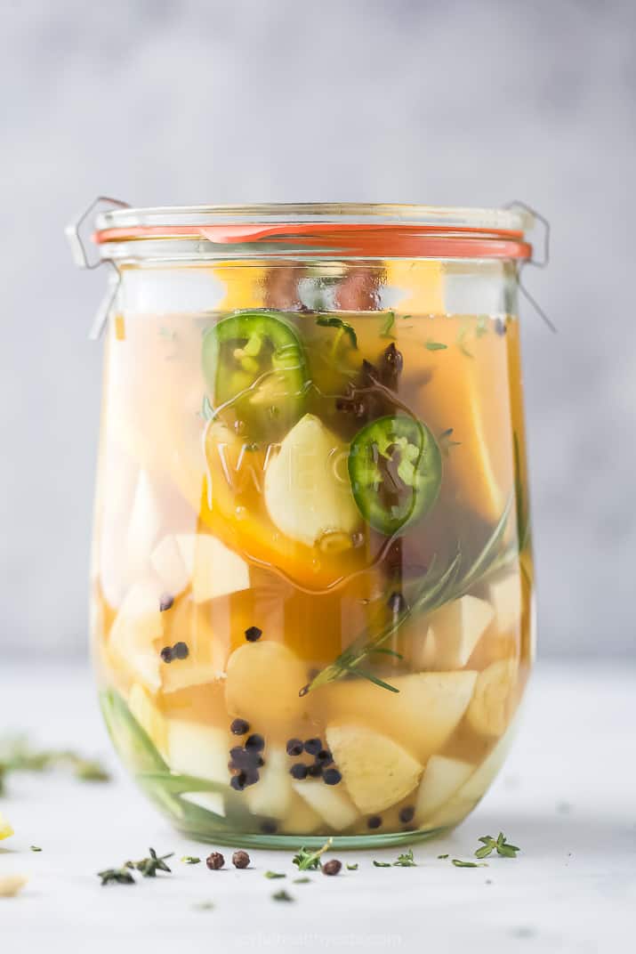 close up of a jar filled with fire cider