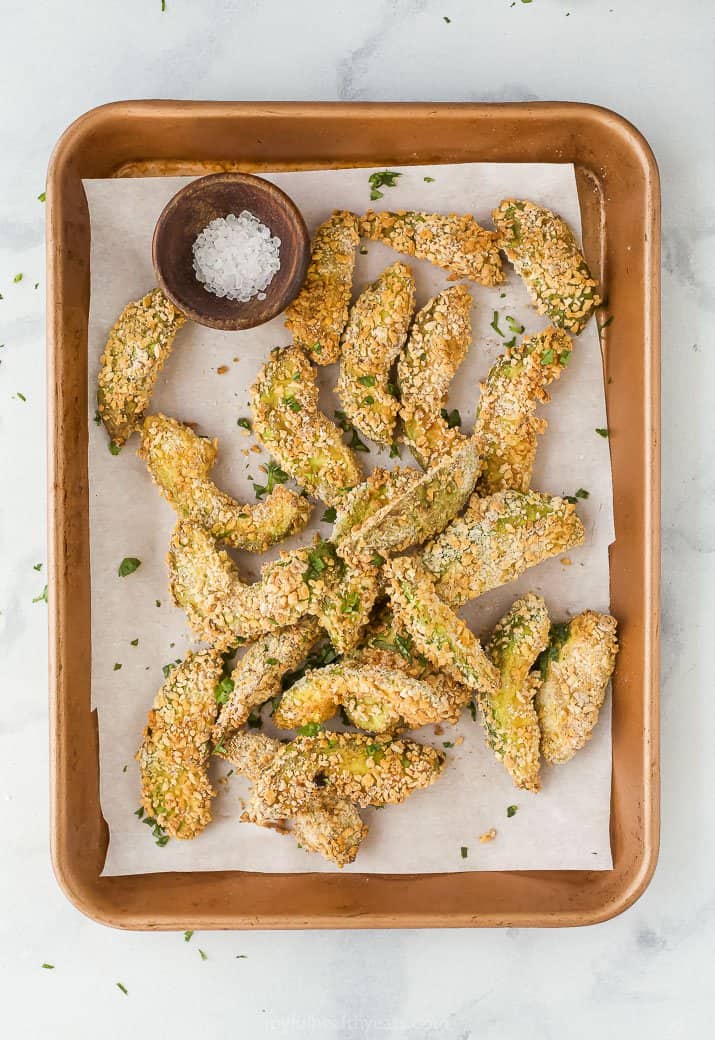 avocado fries on a baking sheet