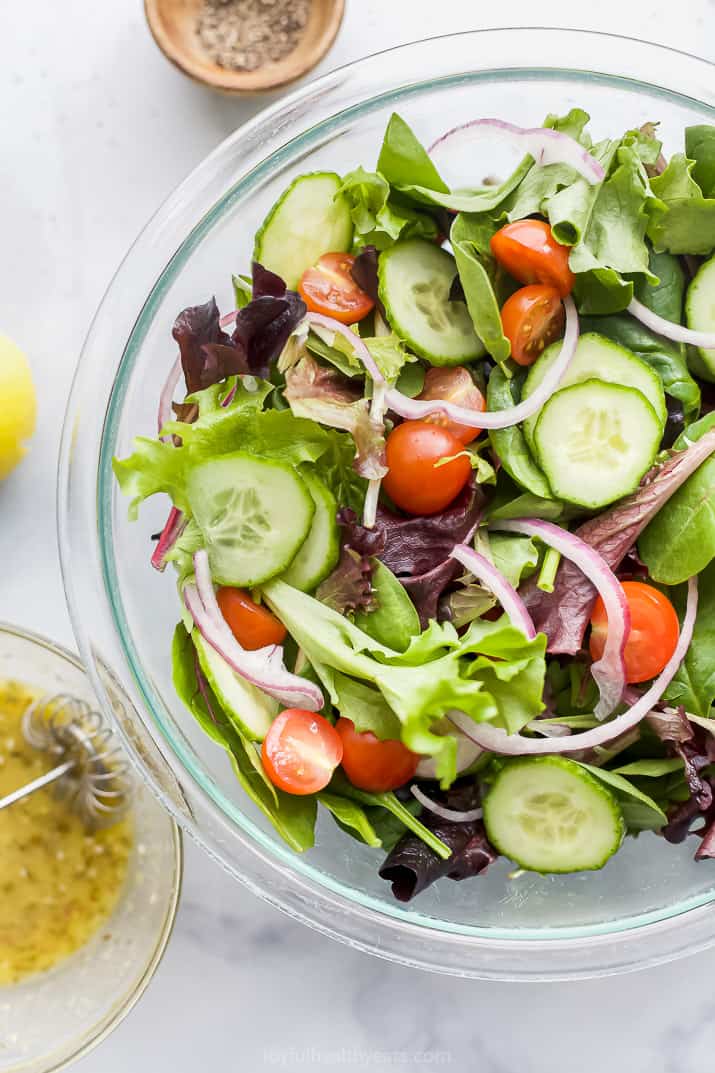 a large bowl with a simple salad