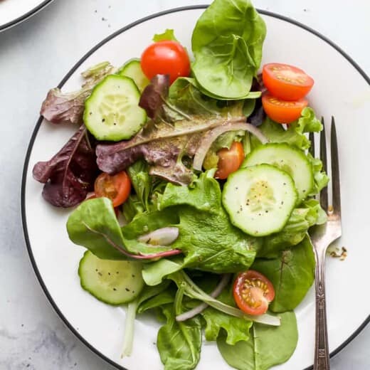 a plate with a simple side salad