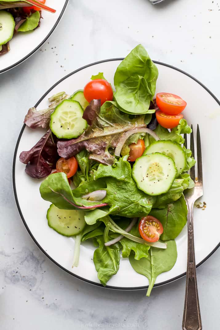 a plate with a simple side salad