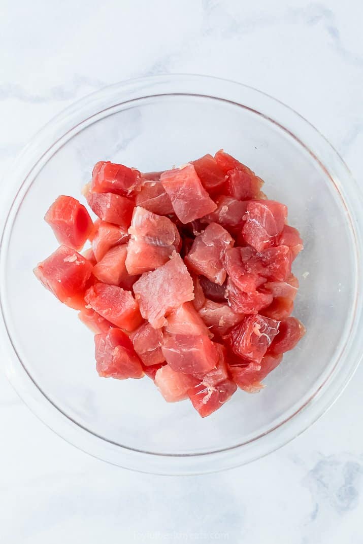 Chunks of Tuna in a Large, Clear Bowl