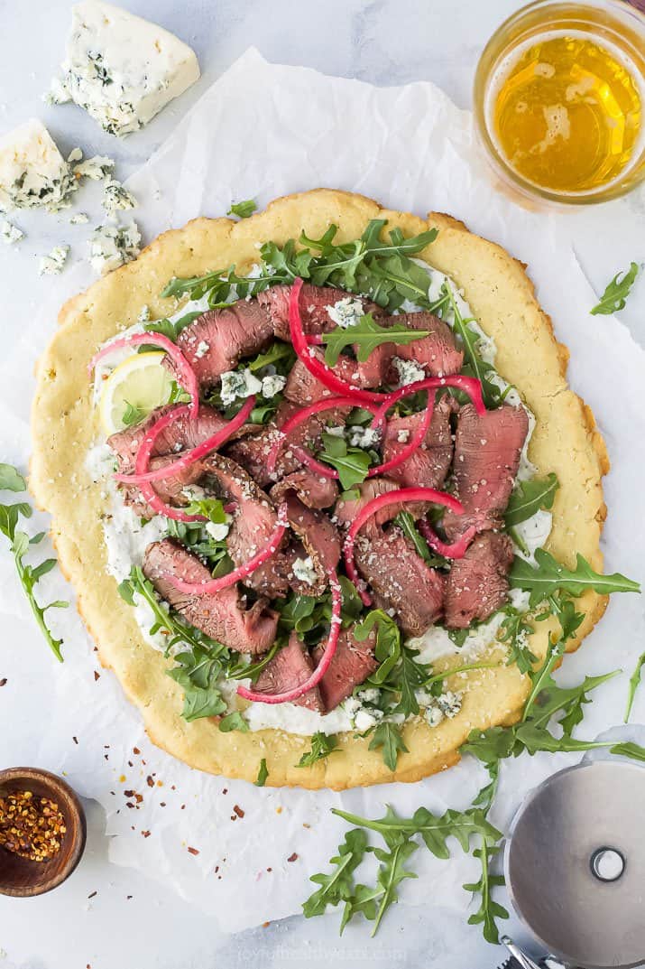 gluten free flatbread topped with steak