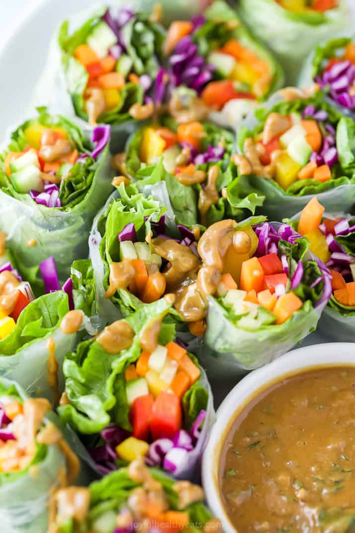 A Plate of Summer Vegetable Rolls with a Little Bit of Peanut Sauce Drizzled Over Them