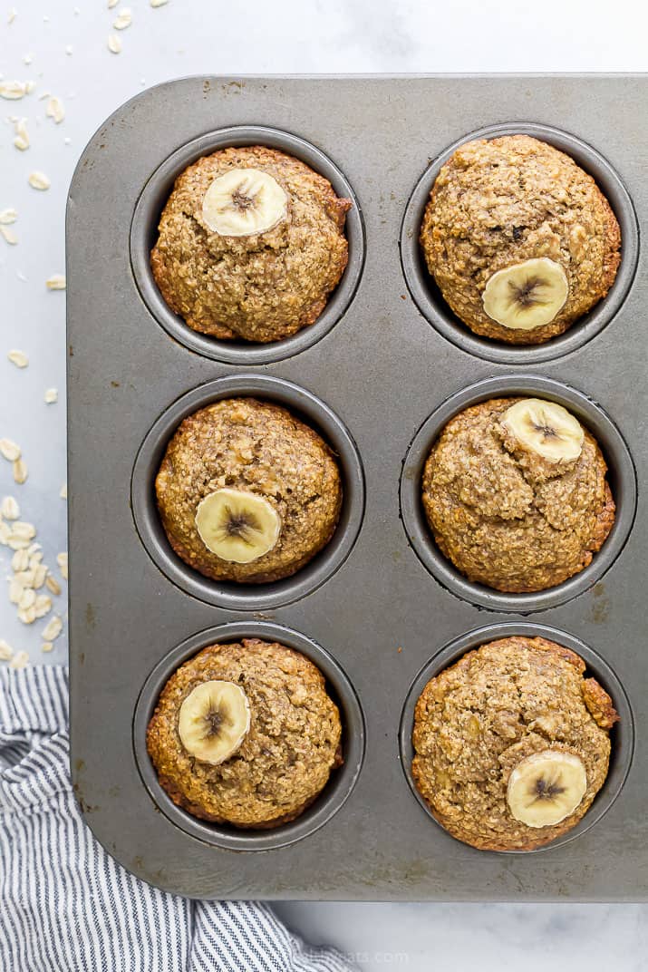 Maple banana oat muffins in a muffin pan