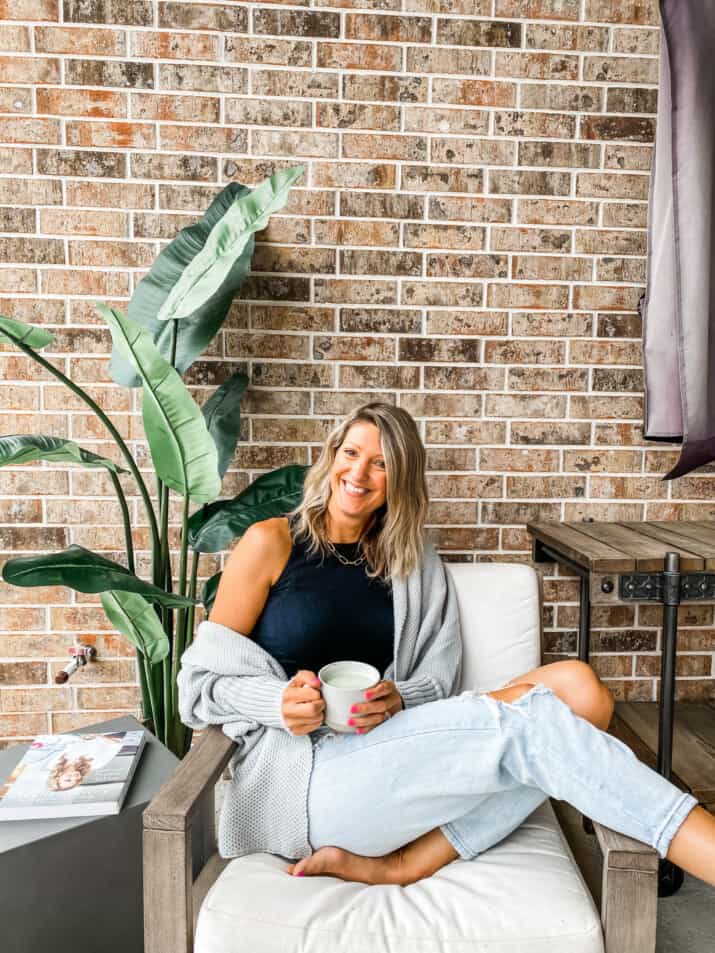 girl holding a latte from daily harvest