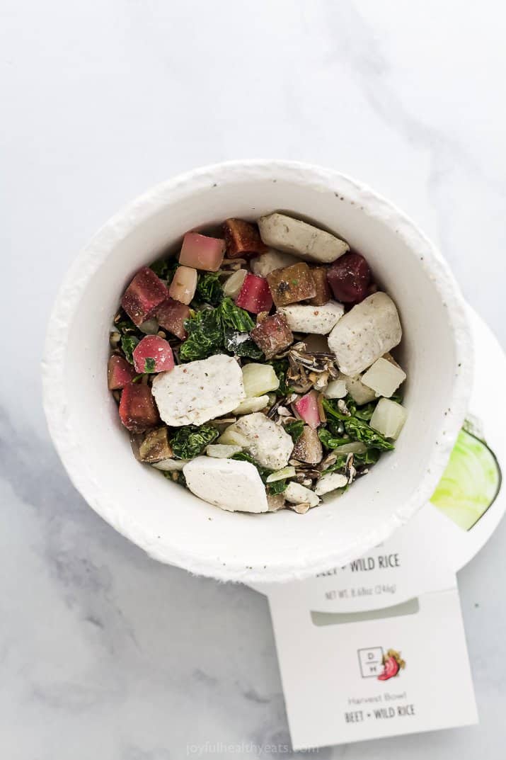 a bowl filled with beet + wild rice mixture