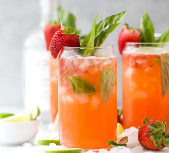 Two glasses with strawberries and vodka