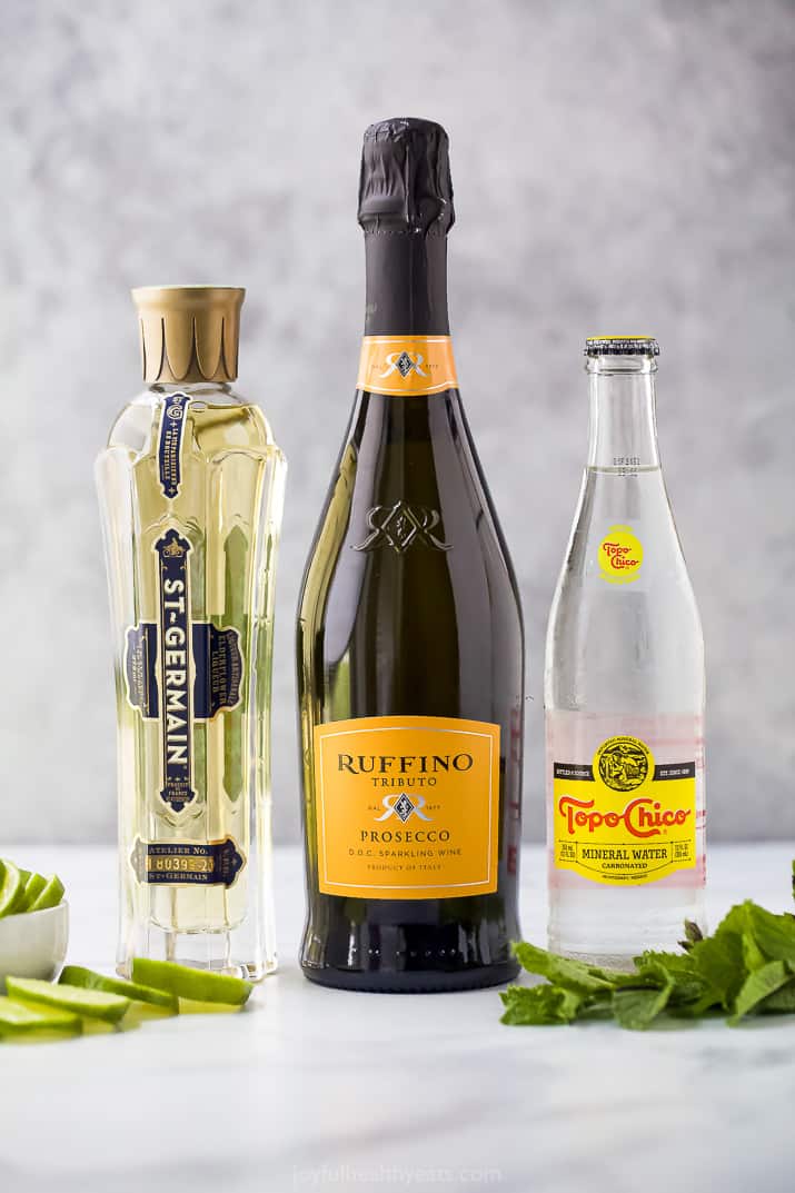 Bottles of St. Germain, Prosecco and mineral water