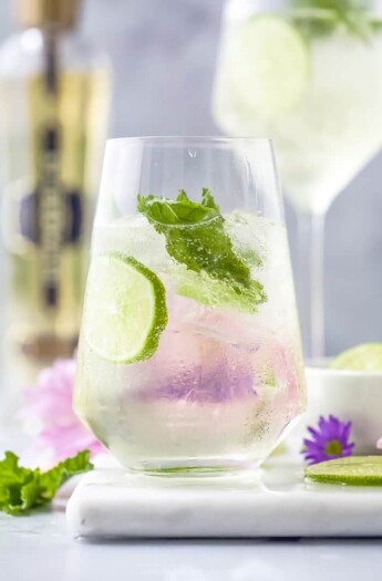 Hugo Cocktail with lime and mint in a large wine glass