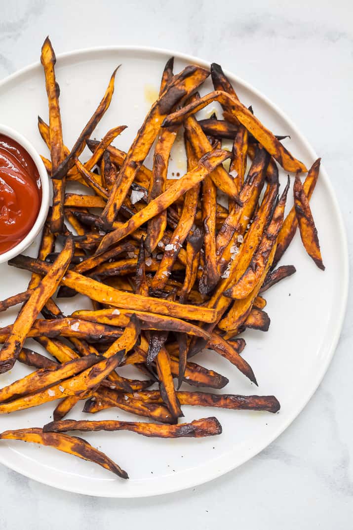 Crispy sweet potato fries on a plate.