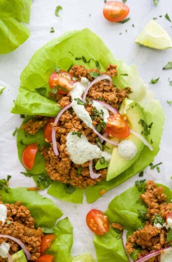 ground turkey taco meat in lettuce wraps with toppings