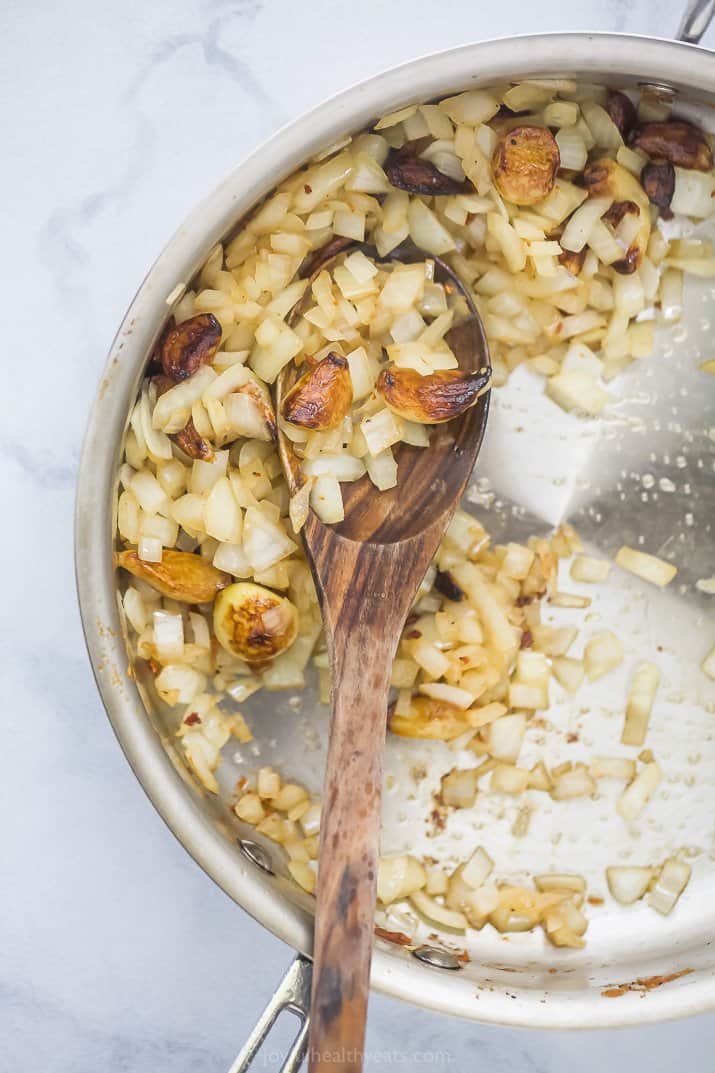 Garlic and onion cooking in a pan.