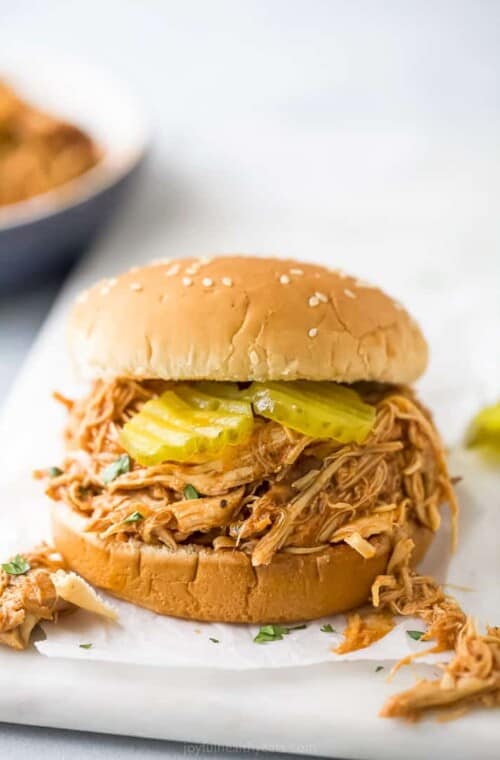 shredded bbq chicken on a bun