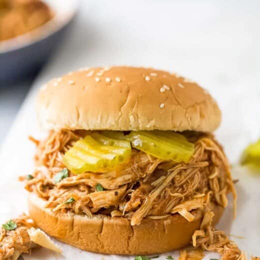 shredded bbq chicken on a bun