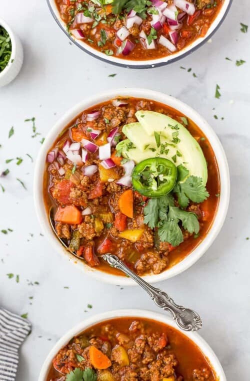 3 bowls of whole30 beef chili with spoons