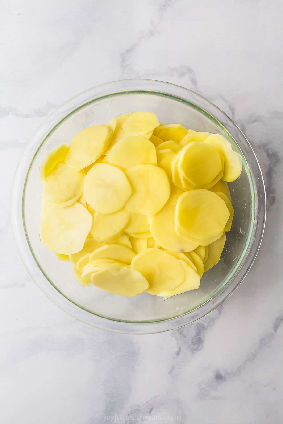 sliced potatoes in a bowl