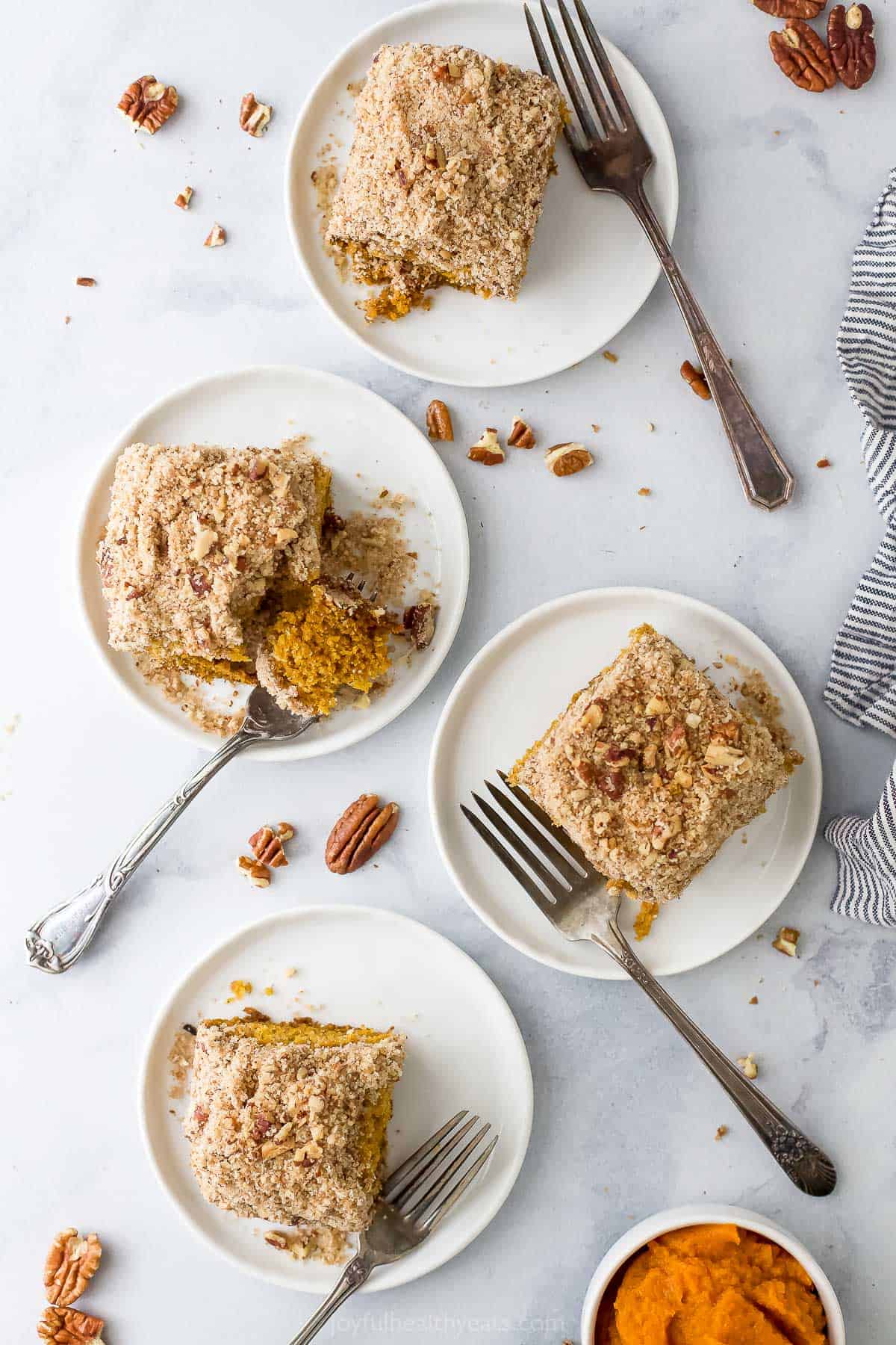 plates with pumpkin spice coffee cake on it