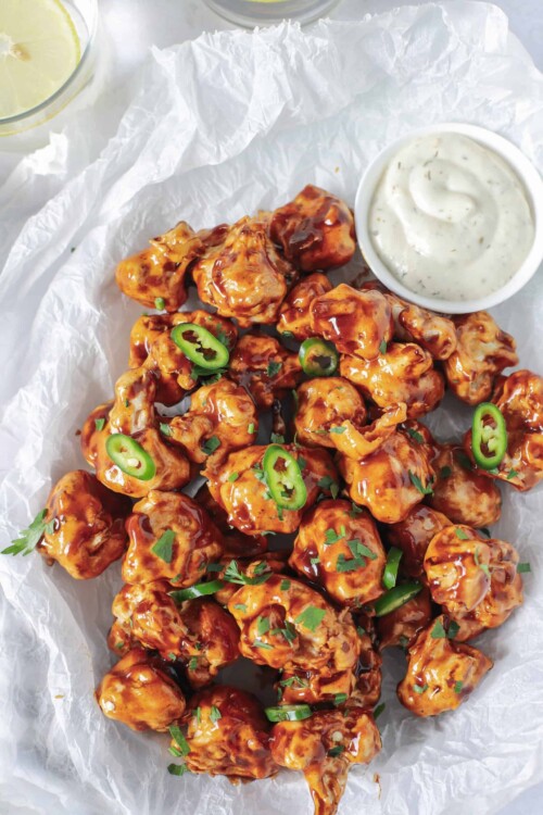 air fryer honey bbq cauliflower wings in a basket