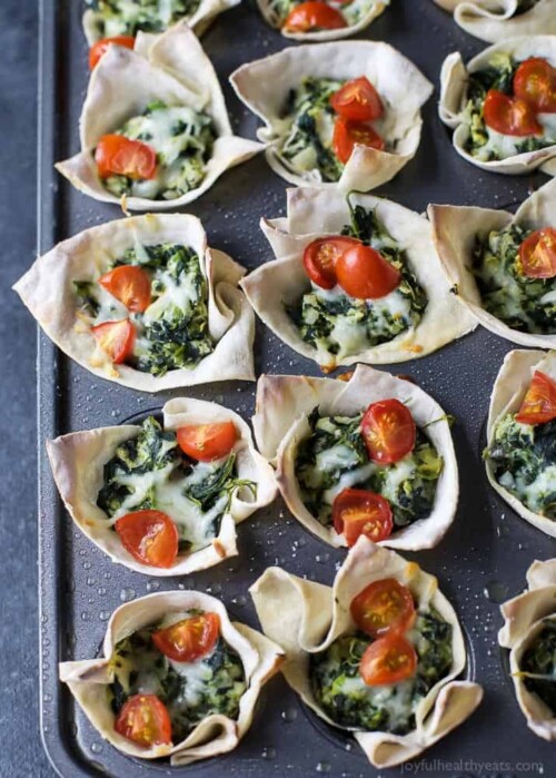 baked wonton cups filled with spinach artichoke dip