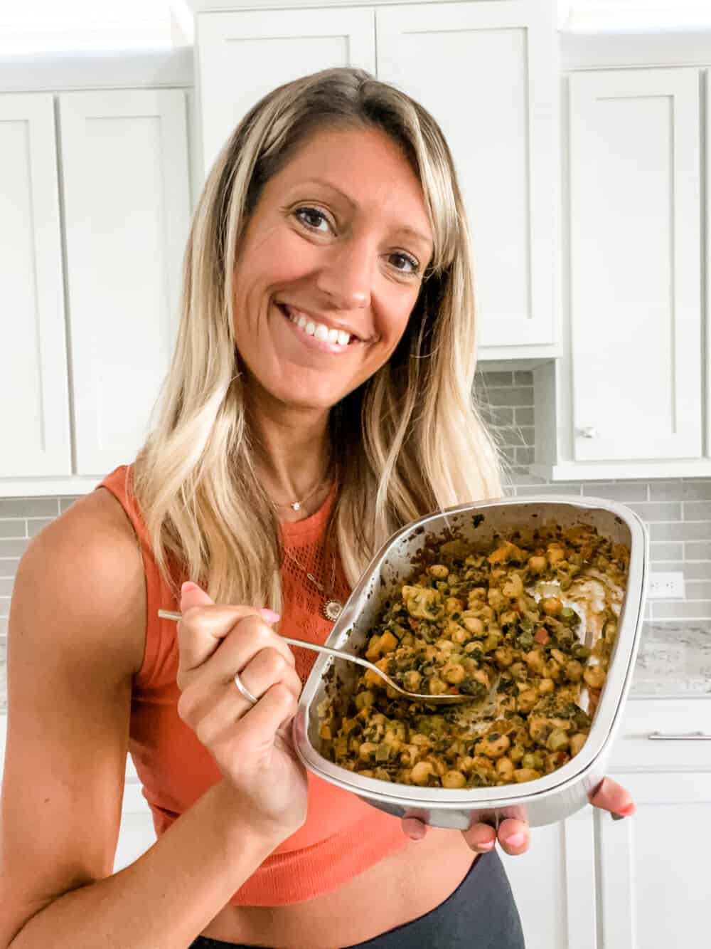 girl holding a daily harvest harvest bake container