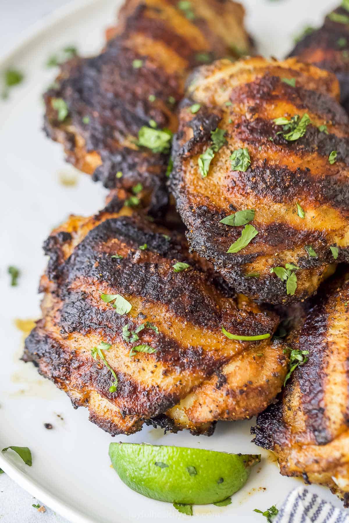 close up of grilled chicken thighs