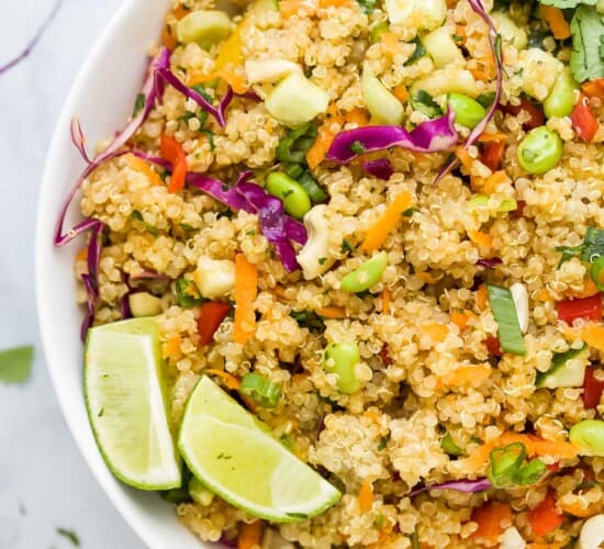 A bowl full of crunchy quinoa salad on top of a kitchen countertop