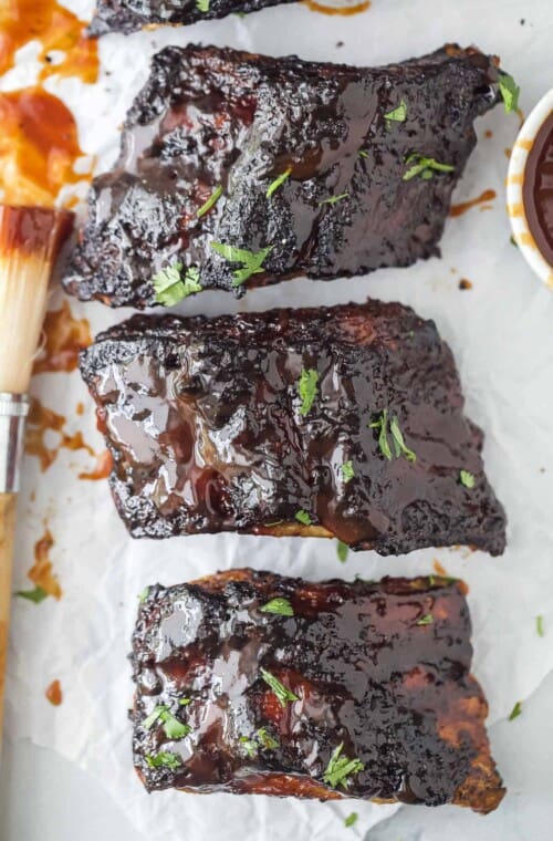 a close up of cooked BBQ ribs