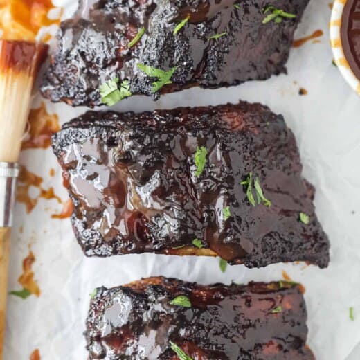 a close up of cooked BBQ ribs
