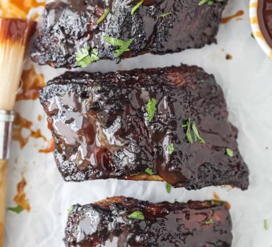 a close up of cooked BBQ ribs