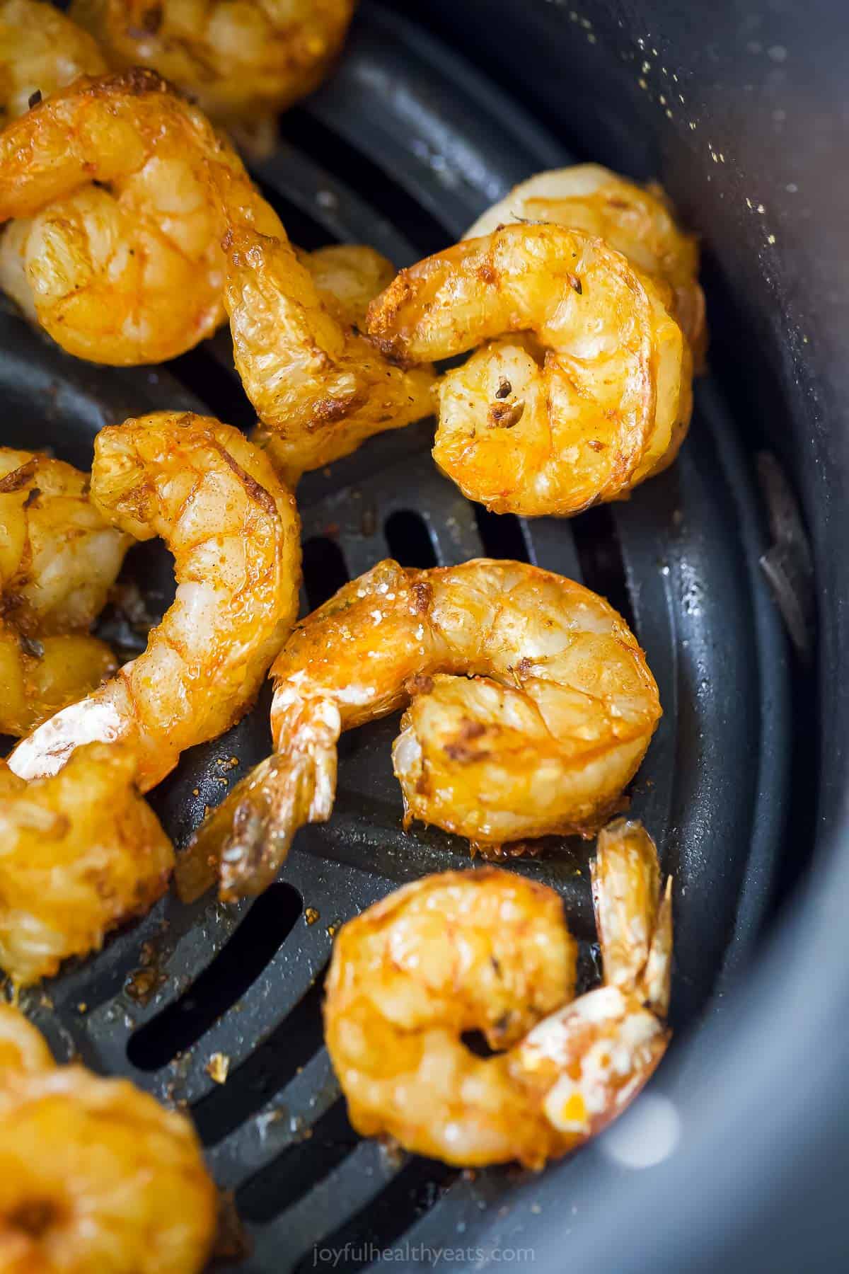 close up of shrimp cooked that have been cooked in an air fryer