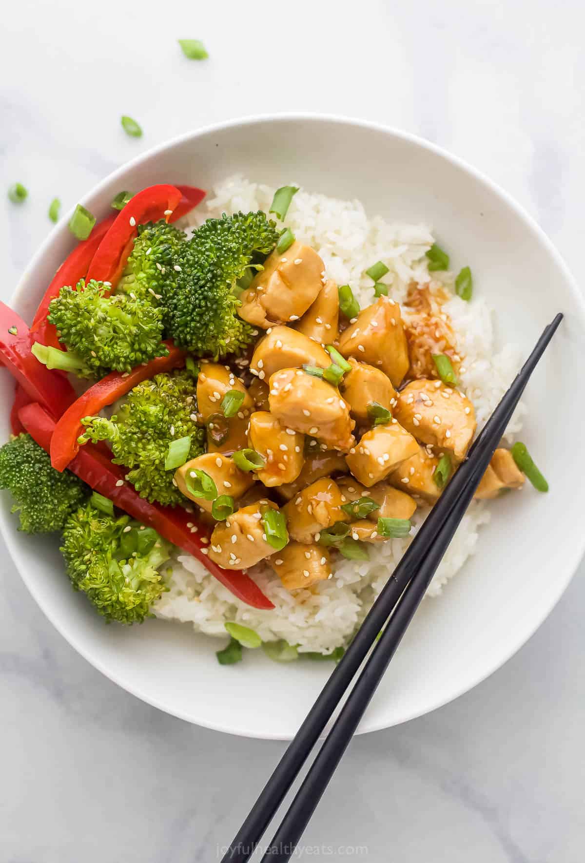 teriyaki chicken bowl with broccoli and red peppers