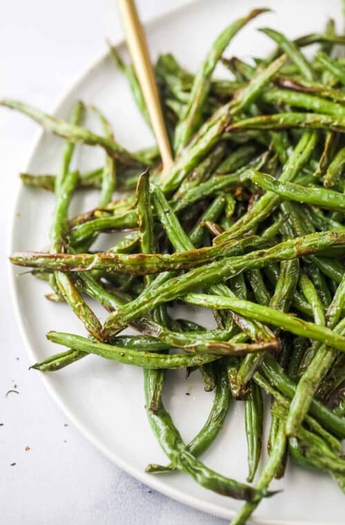 fried green beans on a white plate